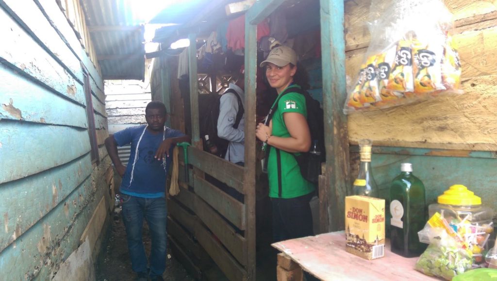 Jamie standing in shop doorway in Equatorial Guinea. 